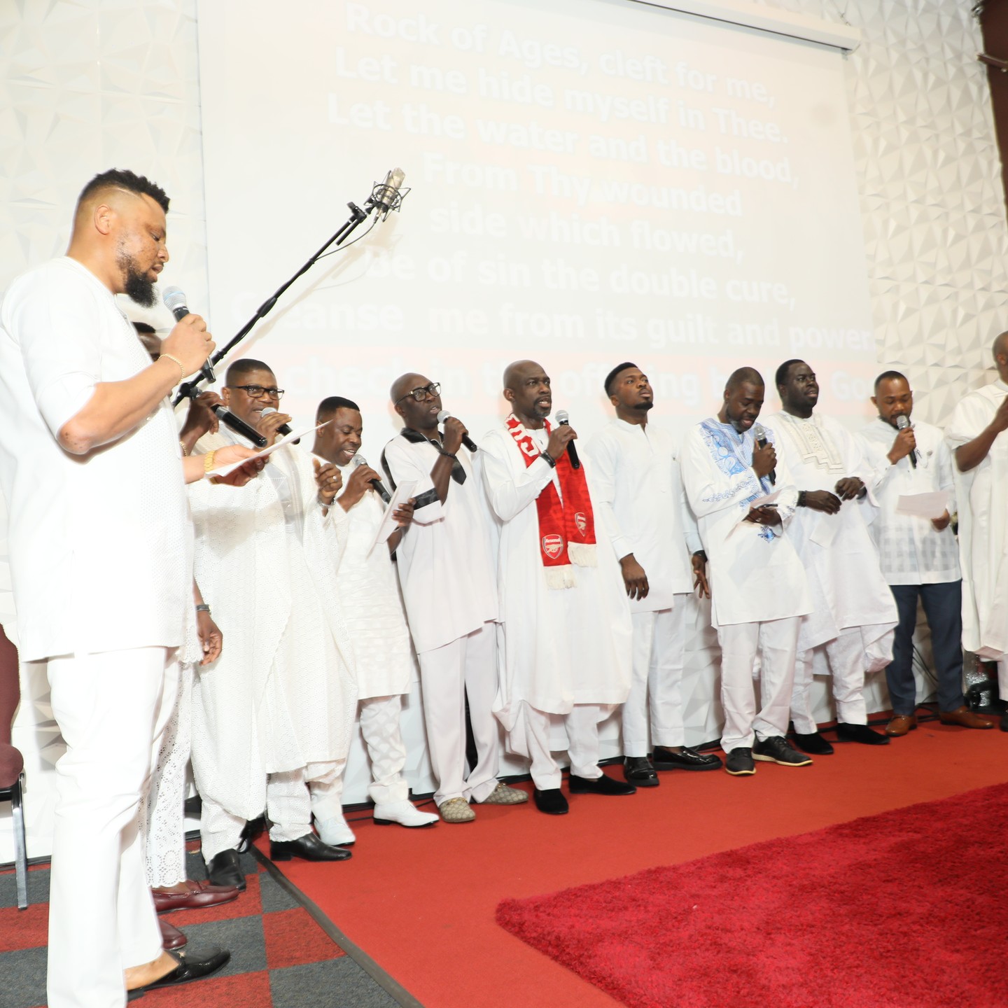 Members of RCCG Solution Center For All Nations gathered on stage together during a special church program